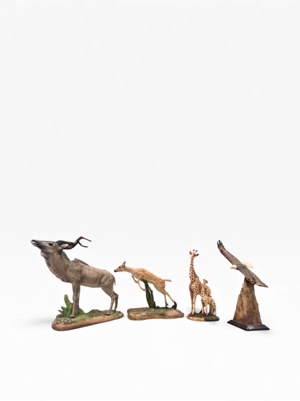 Photo 1 of 4 ASSORTED RESIN FIGURES OF DIFFERENT ANIMALS AND SIZES APPROXIMATELY 10”H