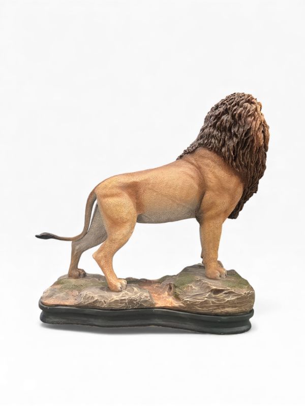 Photo 1 of CREART RESIN LIONESS STANDING ON ROCK WITH A BLACK BASE 626/2500 11.5”H X 11”W