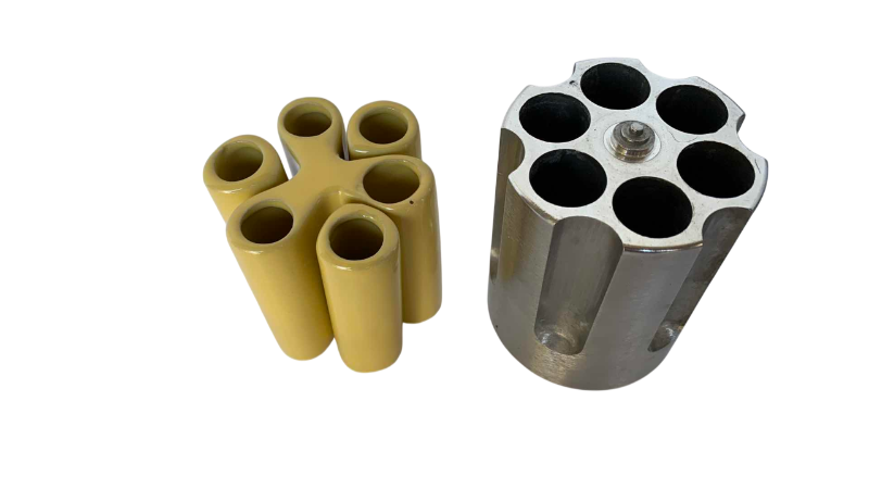 Photo 1 of 2 PENCIL HOLDERS, ONE IS REVOLVER GUN CYLINDER