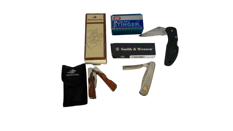 Photo 1 of 3 KNIVES AND .22 SHELLS WINCHESTER SMITH AND WESSON