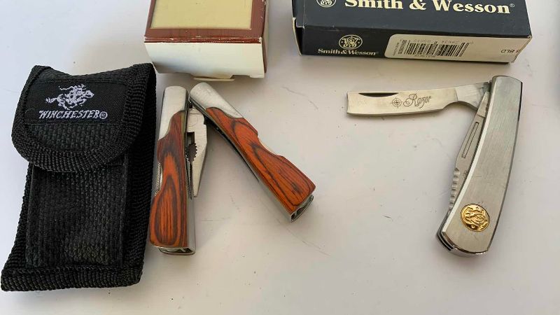 Photo 1 of 3 KNIVES AND .22 SHELLS WINCHESTER SMITH AND WESSON