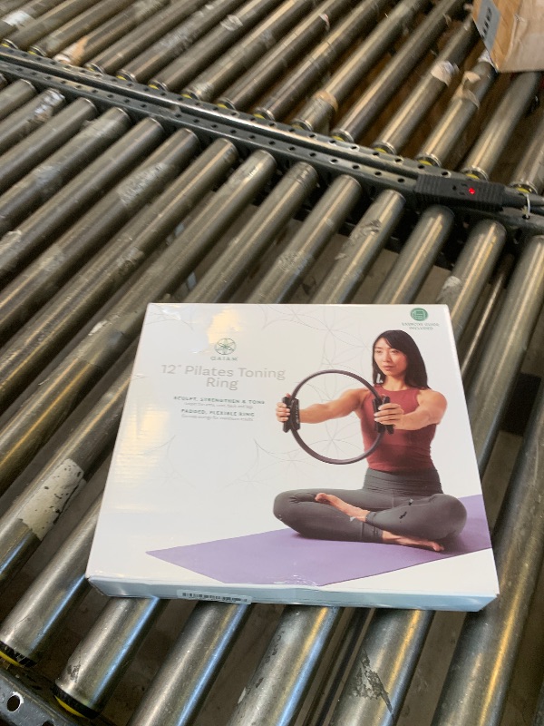 Photo 1 of Gaiam Pilates Ring 12" Fitness Circle - Lightweight & Durable Foam Padded Handles | Flexible Resistance Exercise Equipment for Toning Arms, Thighs/Legs & Core, Black