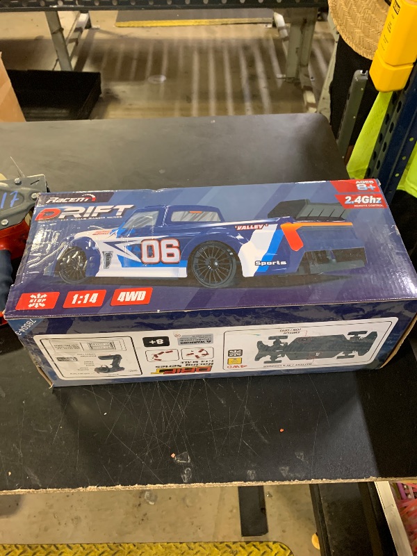 Photo 1 of RACENT 1:14 Drift RC Car, 15MPH 4x4 Remote Control Drifting Vehicle Toy Trucks for Boys Kids Adults with Drifting & Racing Tires, 2 Rechargeable Batteries (White)