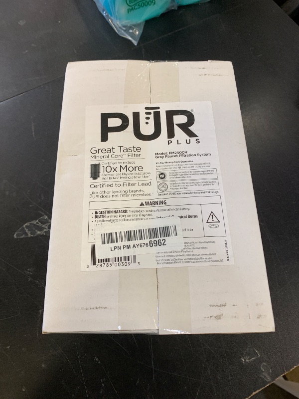 Photo 1 of PUR PLUS Vertical Faucet Mount Water Filtration System, Lead-Reducing Filter, Great-Tasting Water, Easy Install, Lasts 100 Gallons, Compatible with Sinks with External Aerators, Grey