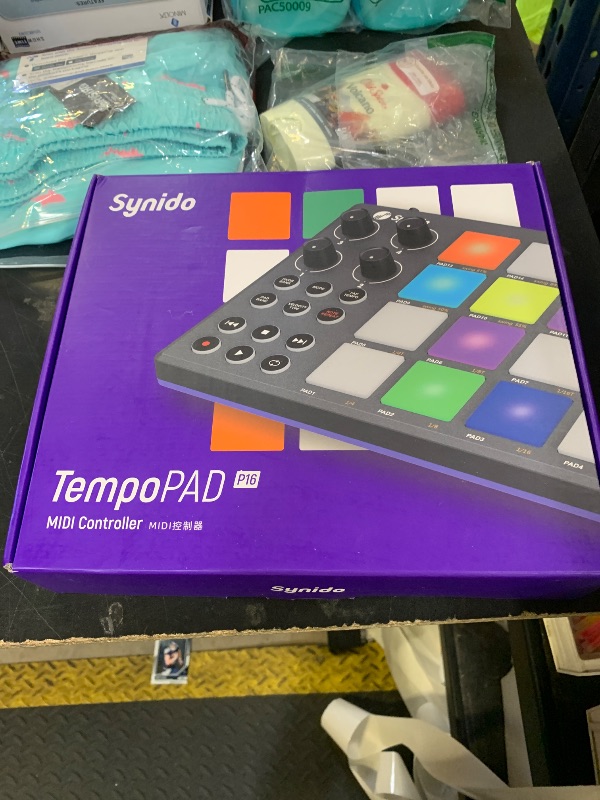 Photo 1 of Synido TempoPAD Midi Controller Beat Maker Machine for Music Production, Portable USB MIDI Beat Pad Controller for Beginners with Durable Carrying Bag, 16 Backlit Beat Pad, 4 Assignable Knob