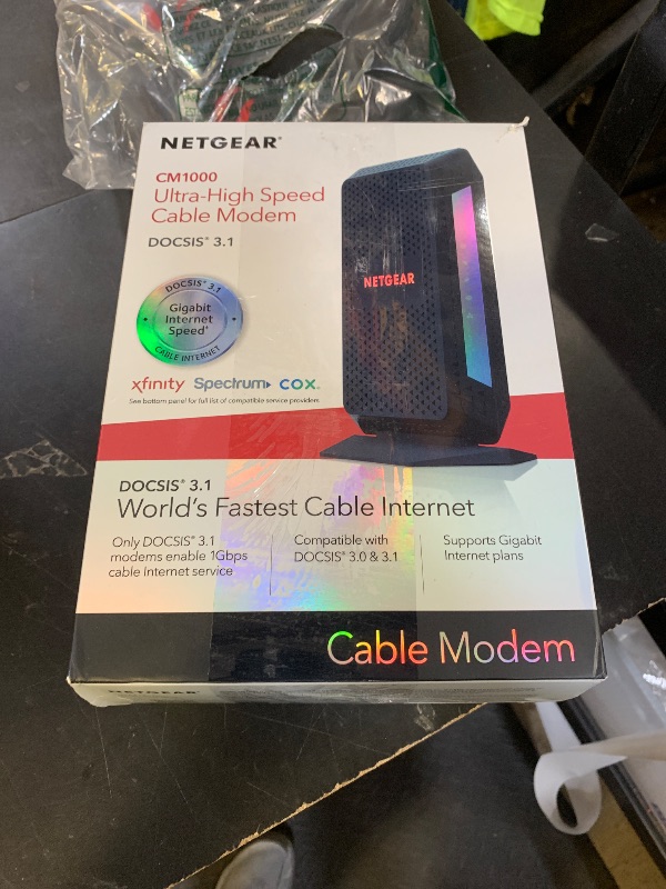 Photo 1 of NETGEAR Cable Modem DOCSIS 3.1 (CM1000) Gigabit Modem, Compatible with All Major ISP Providers Including Xfinity, Spectrum, Cox, for Cable Plans Up to 1 Gbps,Black