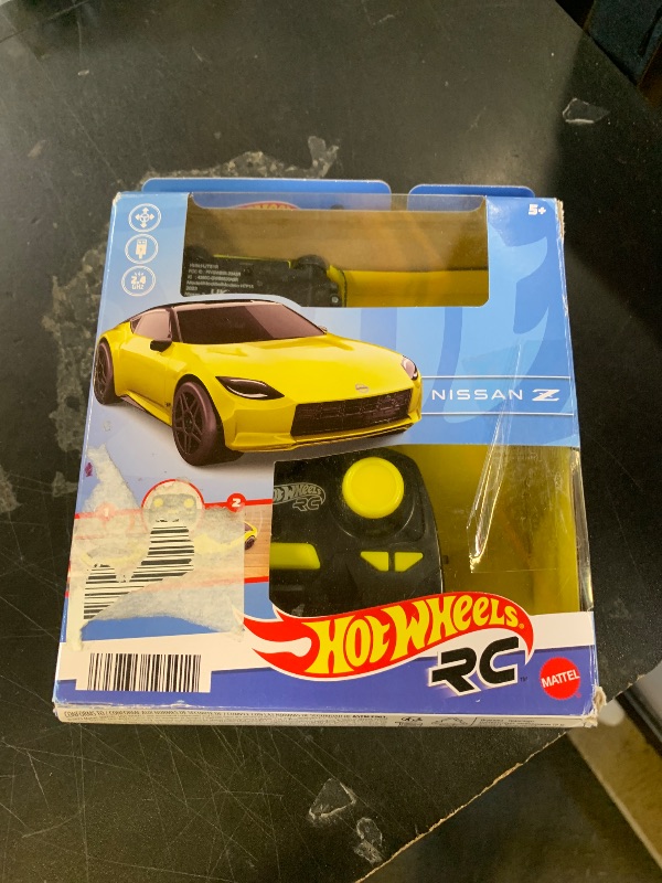 Photo 1 of Hot Wheels RC Toy Car, Remote-Control Nissan Z in 1:64 Scale with Controller & USB Cable, Works On & Off Track cc