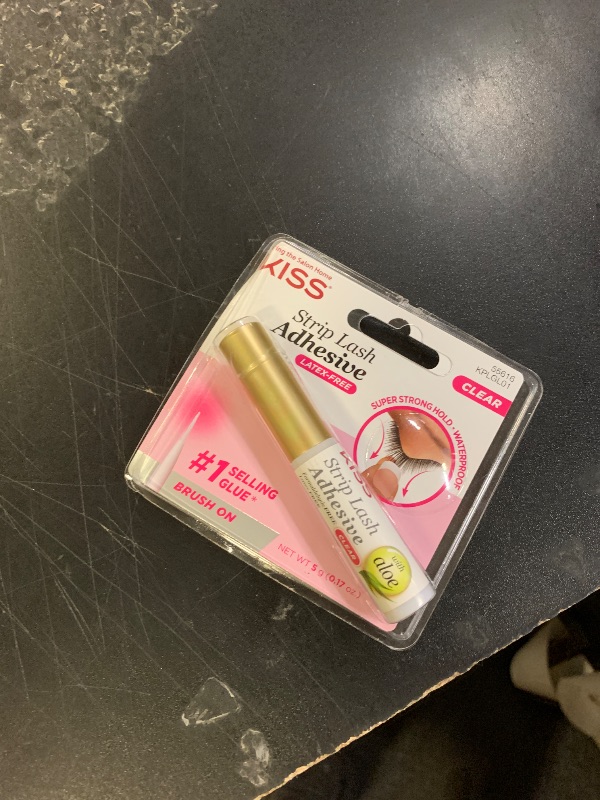 Photo 1 of KISS Strip Lash Adhesive, Lash Glue, 24hr Strip Eyelash Adhesive, Clear, Includes Lash Adhesive, Long Lasting Wear, Can Be Used with Strip Lashes and Lash Clusters