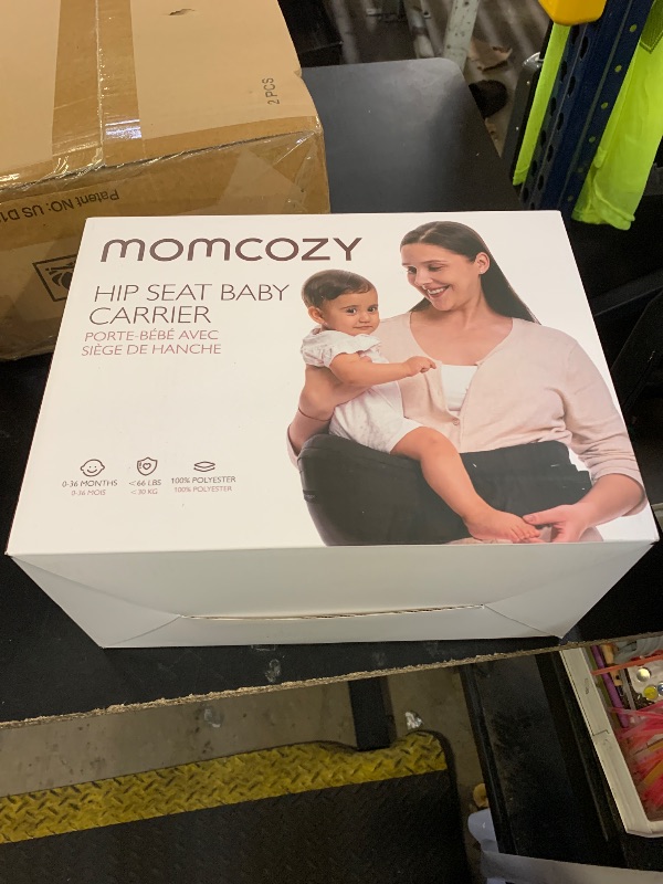 Photo 1 of Momcozy Hip Seat Baby Carrier - Adjustable Waistband with Original 3D Belly Protector, Ergonomic Carrier with Various Pockets for Newborns & Toddlers up to 45lbs (Black, Medium)