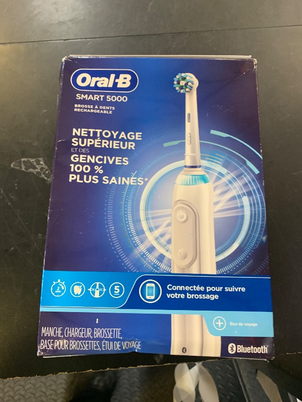 Photo 1 of Oral-B Smart 5000 Rechargeable Electric Powered Toothbrush, Black with Travel Case and Bluetooth - Visible Pressure Sensor to Protect Gums - 5 Cleaning Modes - 2 Minute Timer