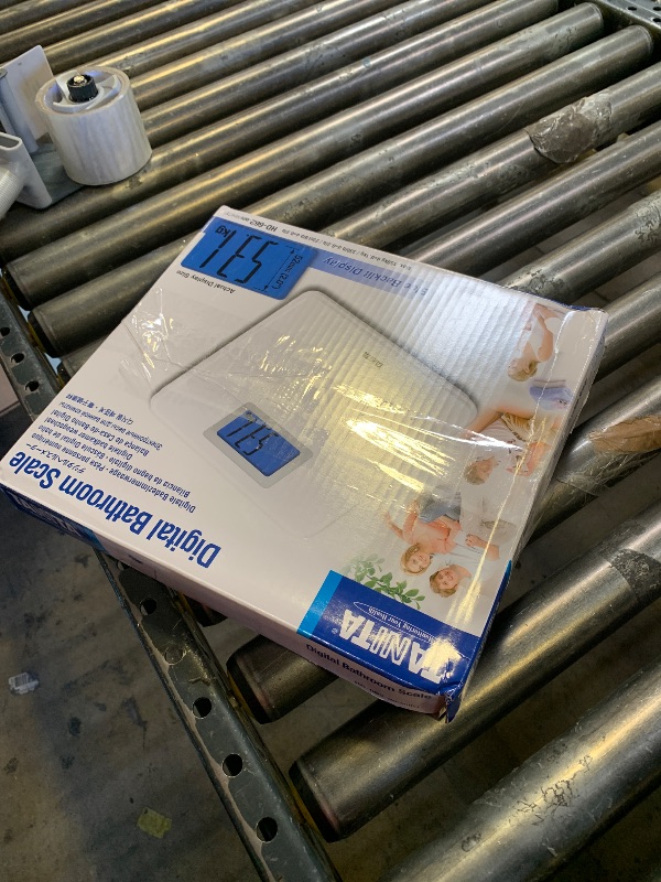 Photo 1 of Tanita HD-662 Digital Weight Scale (White) - Japan Technology Bathroom Scale with 330 lb Weight Capacity - 2" Blue Backlit Large LCD Display - Accurate, Durable, Step-On Operation