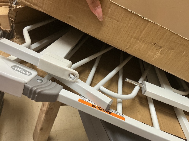 Photo 1 of Regalo Easy Step 49-Inch Extra Wide Baby Gate, Includes 4-Inch and 12-Inch Extension Kit, 4 Pack of Pressure Mount Kit and 4 Pack of Wall Mount Kit