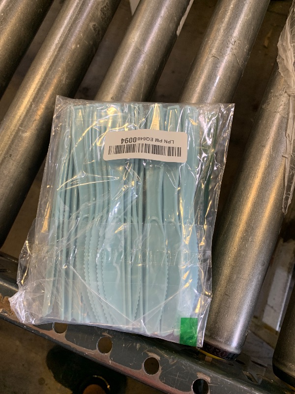 Photo 1 of BAG OF PLASTIC KNIVES