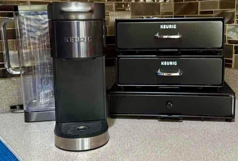 Photo 1 of BLACK KEURIG COFFEE MAKER & 3 POD HOLDERS