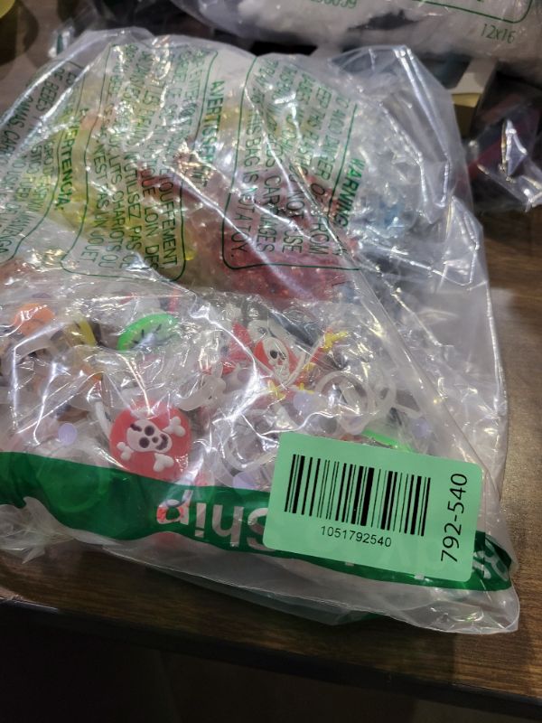 Photo 1 of 100 PCS Halloween Party Favors for Kids Halloween Glow In The Dark Toys Bulk Party Supplies Light Up Rotating Necklace LED Rings Halloween Goodie Bag Fillers Treats Classroom Prizes Trick or Treat Toy