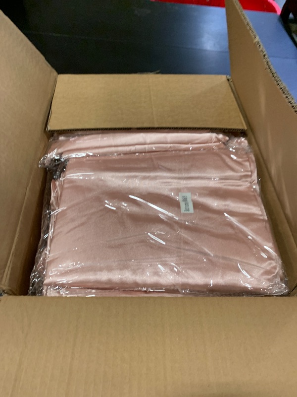 Photo 1 of REWOMC 12 Pack 108 Inch Round Tablecloth, Rose Gold Satin Fabric Table Cloth for Round Tables, Wrinkle Resistant Washable TableCover Bright Silk Table Clothes for Wedding Party Dining Tables Banquet