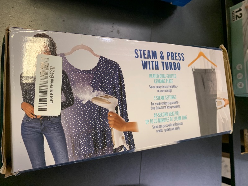 Photo 1 of Conair Handheld Garment Steamer for Clothes, Turbo ExtremeSteam 1875W Fabric Steamer, Portable Handheld Design, Strong Penetrating Steam, White/Champagne