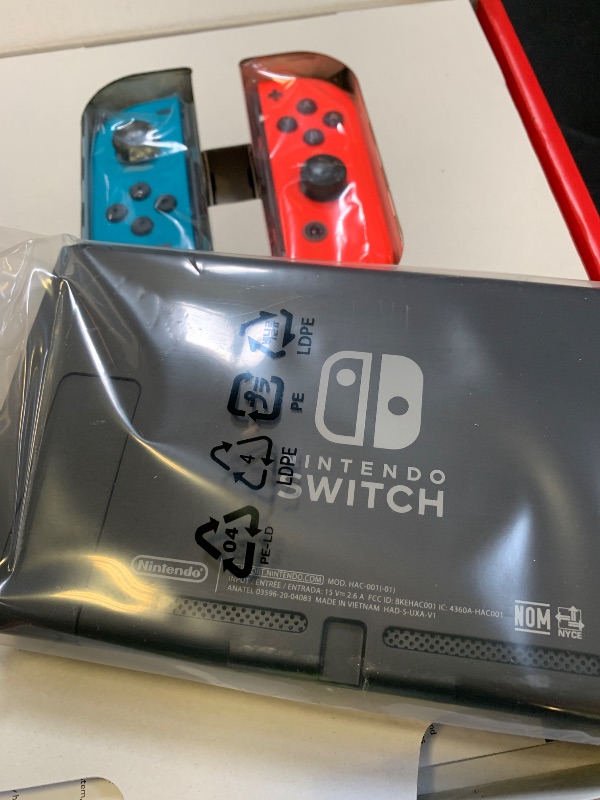 Photo 1 of Nintendo Switch™ with Neon Blue and Neon Red Joy?Con™