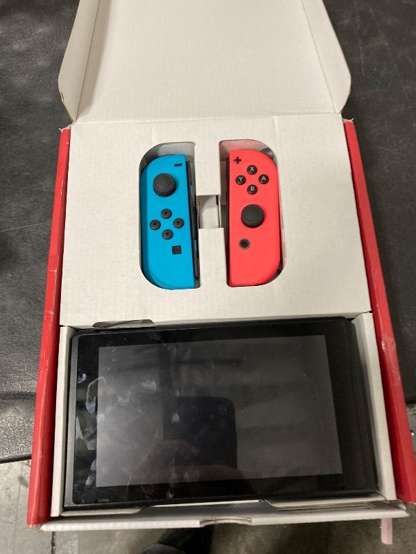 Photo 1 of Nintendo Switch™ with Neon Blue and Neon Red Joy?Con™