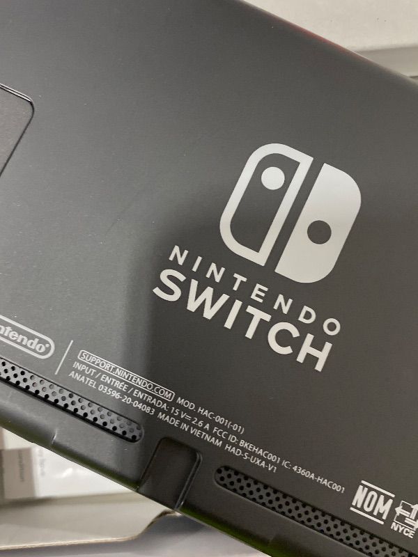 Photo 1 of Nintendo Switch™ with Neon Blue and Neon Red Joy?Con™