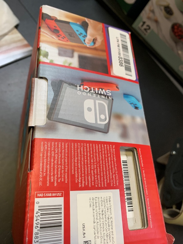 Photo 1 of Nintendo Switch™ with Neon Blue and Neon Red Joy?Con™