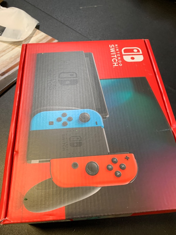 Photo 1 of Nintendo Switch™ with Neon Blue and Neon Red Joy?Con™