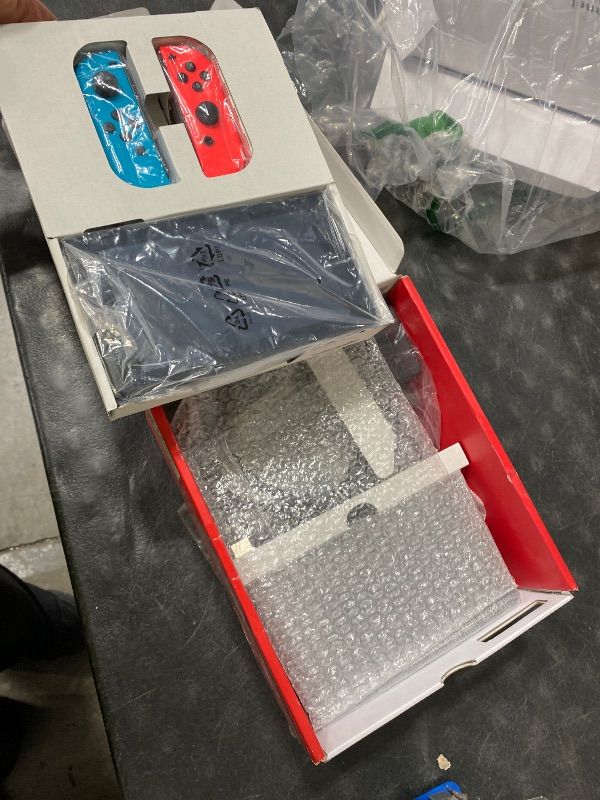 Photo 5 of Nintendo Switch™ with Neon Blue and Neon Red Joy?Con™