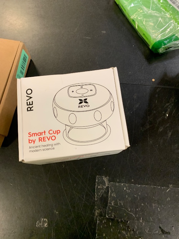 Photo 1 of REVOMADIC REVO The Original 4-in-1 Smart Cupping Therapy Massager, Red Light Therapy for Targeted Pain Relief, Knots, Aches, Muscle Soreness, Circulation & Tighter Skin, Portable Cupping Kit