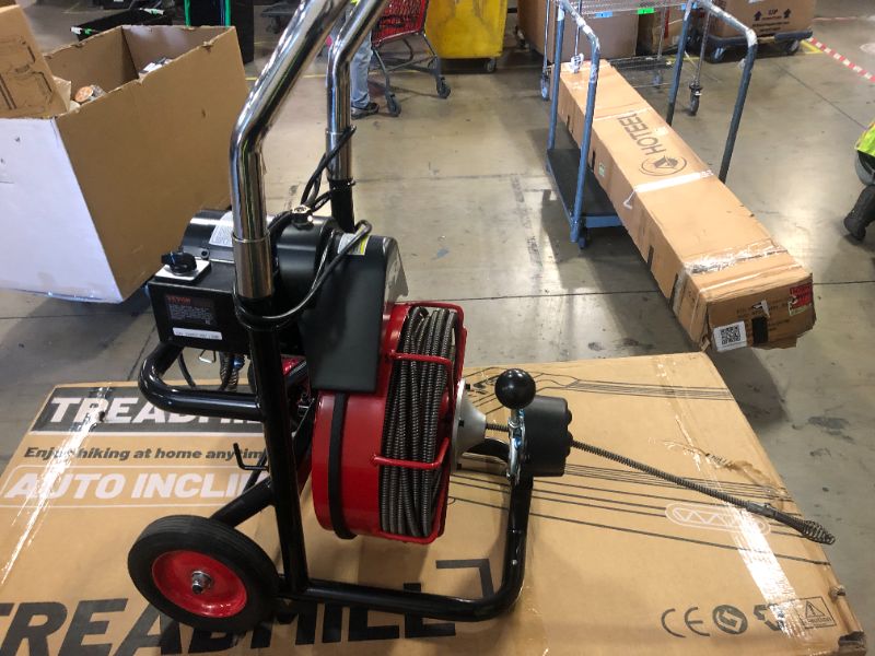 Photo 1 of **USED** UNTESTED* VEVOR Drain Cleaner Machine 100FT x 3/8 Inch, Auto Feed Sewer Snake Auger on Wheels, 370W Portable Drain Cleaning Machine with 8 Cutters & Air-activated Foot Switch for 2" to 4" Pipes