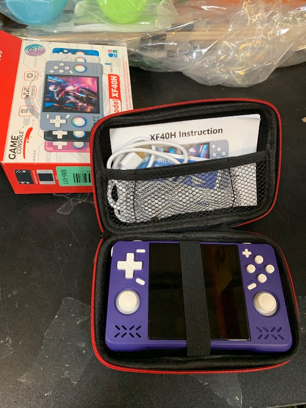 Photo 1 of Upgraded XF40H Handheld Game Console, Retro Gaming Console Preloaded Classic Games with Multiple Emulators, 4.0 Inch 4K HD IPS Screen Open Source Linux System, Pocket Video Gaming (Purple-128G)