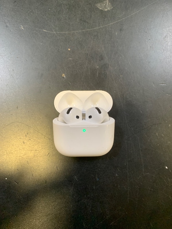Photo 1 of **USED** Apple AirPods 4 Wireless Earbuds, Bluetooth Headphones, Personalized Spatial Audio, Sweat and Water Resistant, USB-C Charging Case, H2 Chip, Up to 30 Hours of Battery Life, Effortless Setup for iPhone