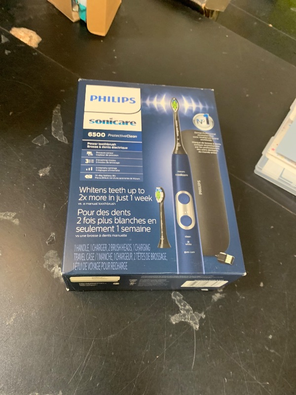 Photo 1 of Philips Sonicare ProtectiveClean 6500 Rechargeable Electric Toothbrush, with Pressure Sensor, 3 Cleaning Modes, SmarTimer and QuadPacer, 14-Day Battery Life, Charging Travel Case, Navy Blue, HX6462/07