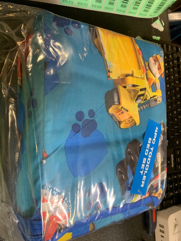 Photo 1 of Paw Patrol Calling All Pups 4 Piece Toddler Bedding Set – Includes Comforter, Sheet Set – Fitted + Top Sheet + Reversible Pillowcase for Boys Bed, Blue