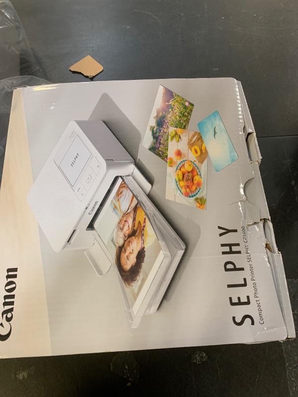 Photo 1 of Canon Selphy CP1500 Wireless Compact Photo Printer (Black)