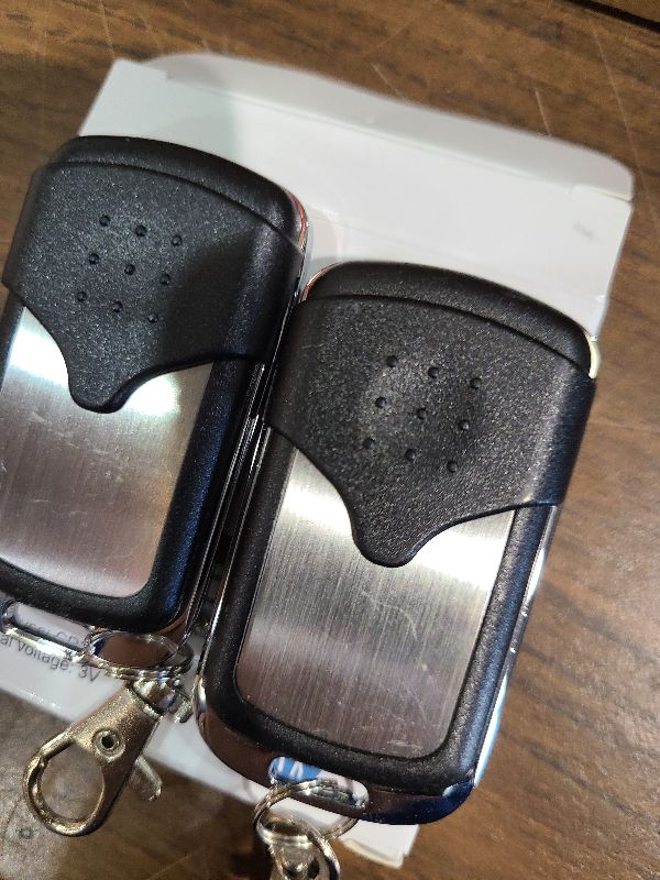 Photo 1 of 2 Pcs Universal Garage Door Opener Remote Keychain 4-Button Programmable Compatible with Liftmaster Chamberlain Craftsman Opener with Purple Yellow Red Orange Green Learn Button