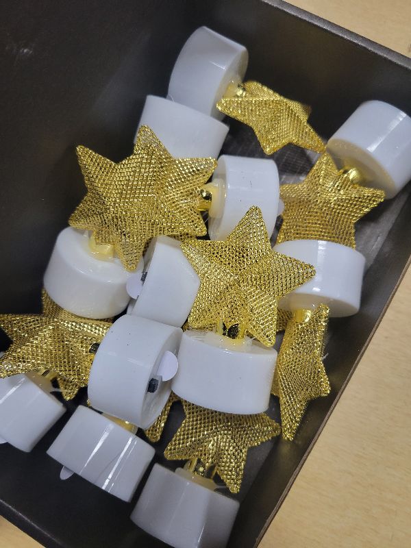 Photo 1 of 12PCS Star Tea Lights Candles(Ironwork), LED Flameless Candles Battery Operated for Holiday Gifts, Led MINI Electric Faker Votive Tealight Candles for Desk, Birthday Decorations (Star, 12)