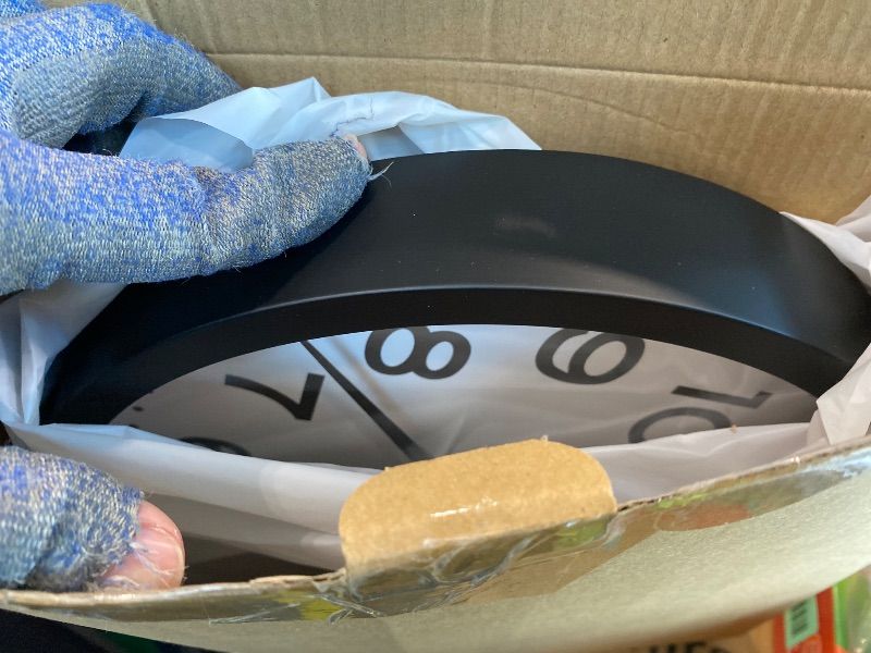 Photo 1 of ***BLACK*** DAXSMY Atomic Wall Clock Analog 12 Inch Battery Operated Modern Decorative for Living Room Kitchen Office Bedroom Bathroom(Silver)