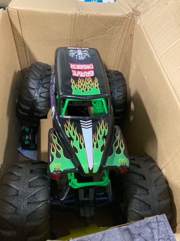 Photo 1 of **AS IS, FINAL SALE** Monster Jam, Official Mega Grave Digger All-Terrain Remote Control Monster Truck, Over 2 Ft. Tall, 1:6 Scale, Kids Toys for Boys and Girls Ages 4 and Up