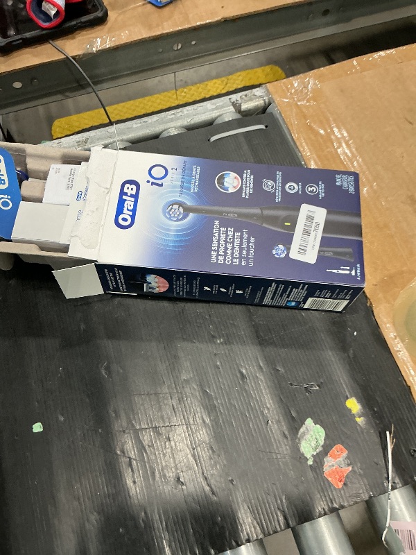 Photo 1 of *UNTESTED*
Oral-B Rechargeable Electric Toothbrush, iO2 Starter Kit, 3 Cleaning Modes, Automatic Pressure Sensor to Protect Gums, 2 Brush Heads, Night Black