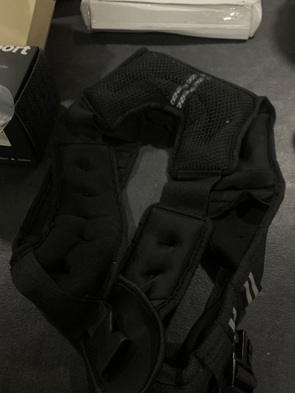 Photo 1 of weighted vest weight unknowwn