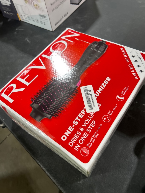 Photo 1 of REVLON One-Step Volumizer Hair Dryer and Styler – Easy Salon-Style Blowouts – Less Frizz, More Shine, and Reduced Heat Damage, for All Hair Types and Lengths (Black)
