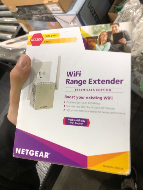 Photo 1 of NETGEAR WiFi Range Extender (EX6120) - Add up to 1,500 sq. ft., 25 Devices - AC1200 Dual Band Wireless Signal Booster & Repeater (Up to 1.2 Gbps Speed), Compact Wall Plug Design – Free Expert Help