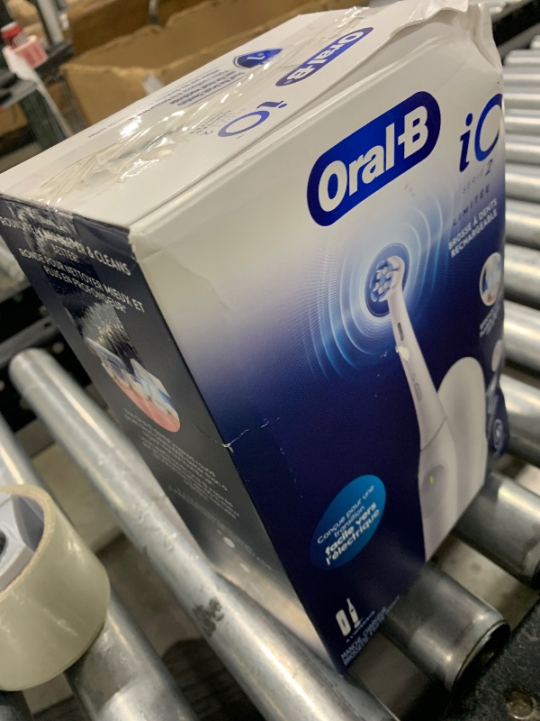 Photo 1 of Oral-B iO Simple Clean Rechargeable Electric Powered Toothbrush, Pure White with 1 Gentle Care Brush Head and 1 White Travel Case - Automatic Pressure Sensor to Protect Gums - 3 Modes -2 Min Timer