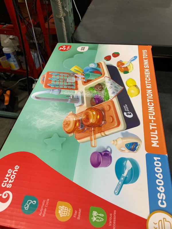 Photo 1 of CUTE STONE Pretend Play Kitchen Sink Toys with Play Cooking Stove, Pot and Pan with Spray Realistic Light and Sound, Dish Rack & Play Cutting Food, Utensils Tableware Accessories for Kids Toddlers