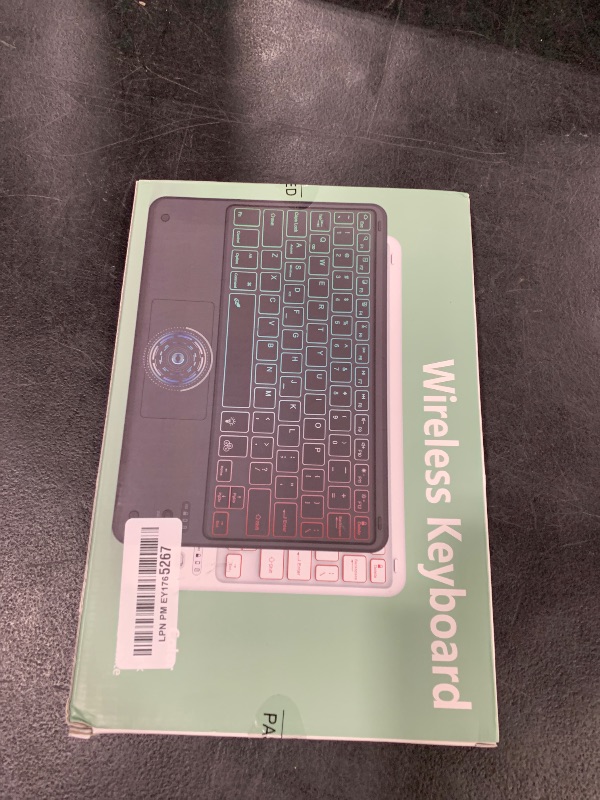 Photo 1 of TOPIPRO Bluetooth Keyboard, Slim 7 Colors Backlit Wireless Bluetooth Keyboard with Touchpad Built in Rechargeable Battery for iOS Android Windows Tablets PC Smartphone