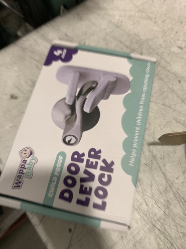 Photo 1 of Door Lever Locks (4 Pack) - Prevents Toddlers from Opening Doors - Durable ABS with 3M Adhesive - Easy One-Hand Operation for Adults, No Tools Needed