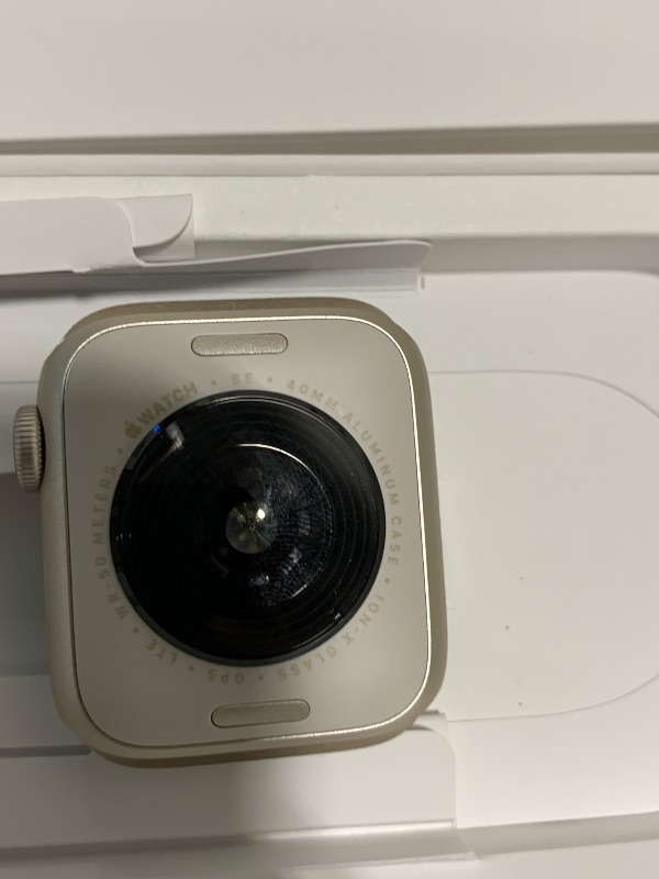 Photo 1 of Apple Watch SE (2nd Gen) [GPS + Cellular 40mm] Smartwatch with Starlight Aluminum Case with Starlight Sport Band S/M. Fitness and Sleep Trackers, Crash Detection, Heart Rate Monitor, Retina Display