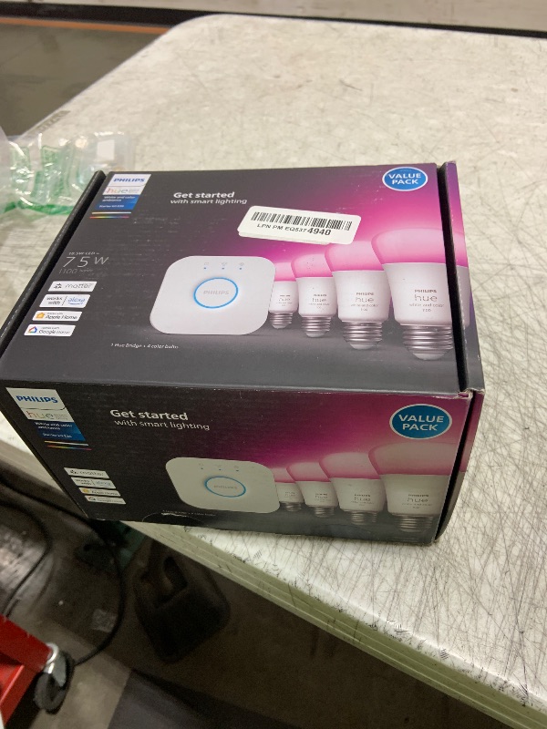 Photo 1 of Philips Hue Smart Light Starter Kit - Includes (1) Bridge and (4) 75W A19 E26 LED Smart White and Color Ambiance Bulbs - Control with App - Compatible with Alexa, Google Assistant, and Apple HomeKit