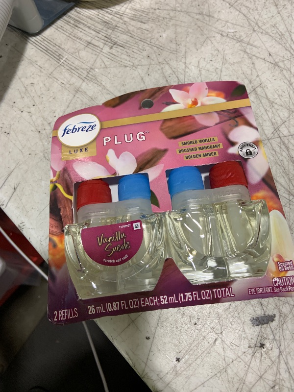 Photo 1 of Febreze Plug In Air Freshener, Odor-Fighting Scented Oil Refill, Vanilla Suede Scent, 2 Refill