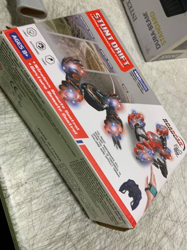 Photo 1 of Remote Control Car, Gesture Sensing RC Stunt Car, 4 WD Transform Off Road for Rotating, 2.4Ghz Hand Controlled Remote Control Twister Cars, RC Cars for Kids Boys Girls Toy Gift Age 6 7 8 9 10 11 12 yr